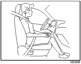 When seated as shown in the above illustration,