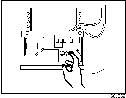 6) At the garage door opener receiver